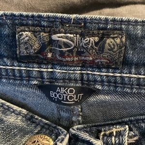 Silver boot cut jeans, great condition!